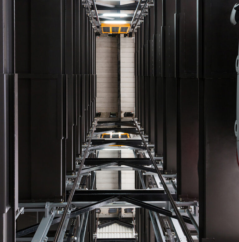 Automated car parking system is a mechanical system designed to minimize the area and maximize the number of parking spaces. (Bottom up view)